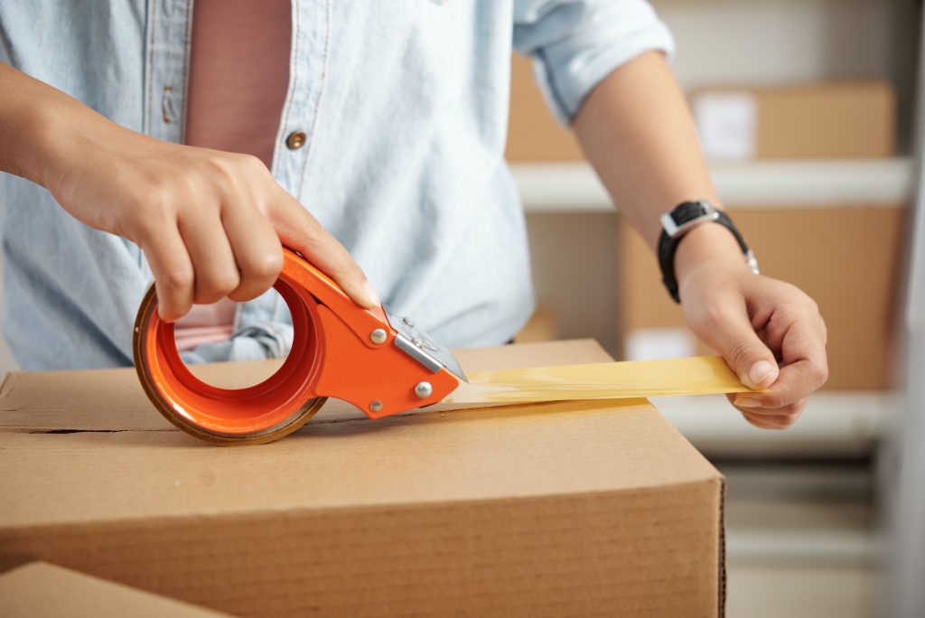 Woman packing box